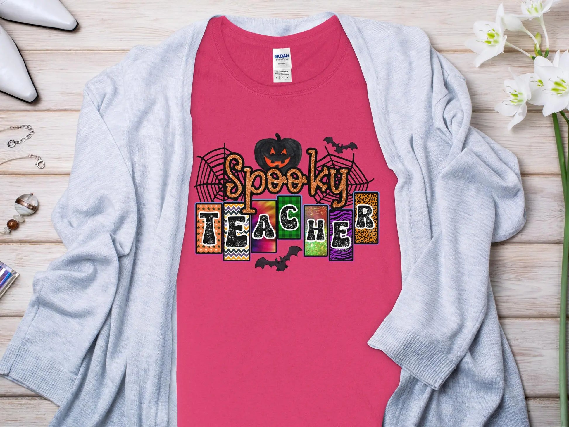 This Halloween Teacher T-Shirt is crafted from high-quality fabric in sizes to fit all shapes and size - Creations Unlimited