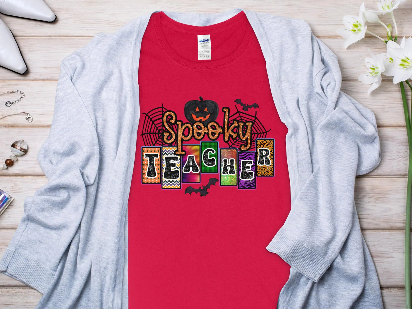 This Halloween Teacher T-Shirt is crafted from high-quality fabric in sizes to fit all shapes and size - Creations Unlimited